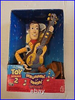 NIB 1999Toy Story 2 Strummin' Singin' Woody Cowboy Doll in Box Disney Pixar