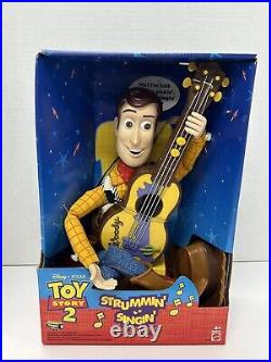 NIB 1999Toy Story 2 Strummin' Singin' Woody Cowboy Doll in Box Disney Pixar