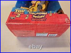 NIB 1999Toy Story 2 Strummin' Singin' Woody Cowboy Doll in Box Disney Pixar