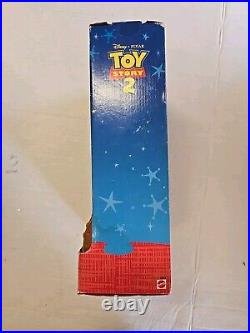 NIB 1999Toy Story 2 Strummin' Singin' Woody Cowboy Doll in Box Disney Pixar