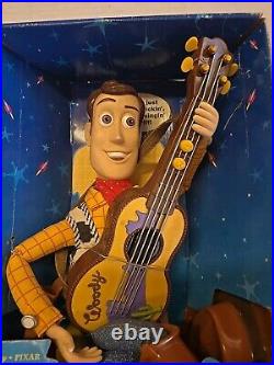 NIB 1999Toy Story 2 Strummin' Singin' Woody Cowboy Doll in Box Disney Pixar