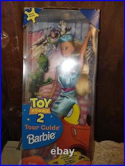 NRFB 1999 Mattel Toy Story 2 Tour Guide Barbie Doll #24015 with Woody Buzz Puppets