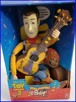 TOY STORY 2 STRUMMIN' SINGIN' Whistlin Guitar Pickin WOODY NEW NIB Disney Pixar