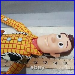 Toy Story Sheriff Woody Pull String Talking Doll theres a snake boot. Orign