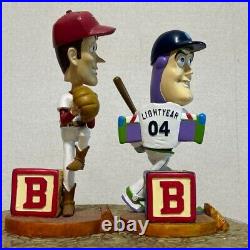 Toy Story Strikeout Woody and Slugger Buzz Lightyear Bobbleheads Used