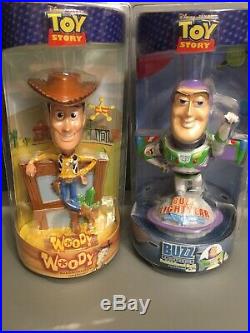 Toy story buzz lightyear and Woody Bobble Head Dolls Sealed New In Package