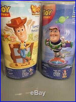 Toy story buzz lightyear and Woody Bobble Head Dolls Sealed New In Package