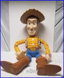 Vintage Disney Toy Story Large Woody Doll 32 has some paint and scratche's