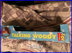 Woody pull string talking doll (new in box). 1995